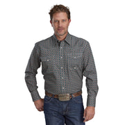 Man wearing a patterned shirt and jeans on a white background