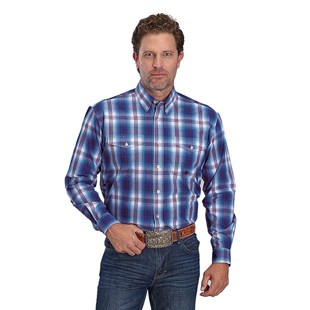 Man wearing a blue plaid shirt and jeans on a white background