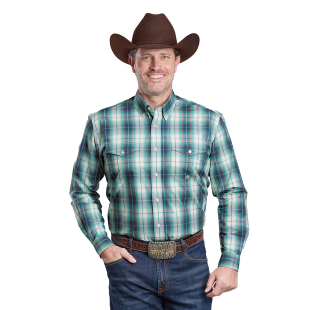 Man wearing a plaid shirt, jeans, and a cowboy hat on a white background