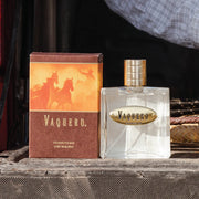 Vaquero cologne bottle and packaging on a wooden surface