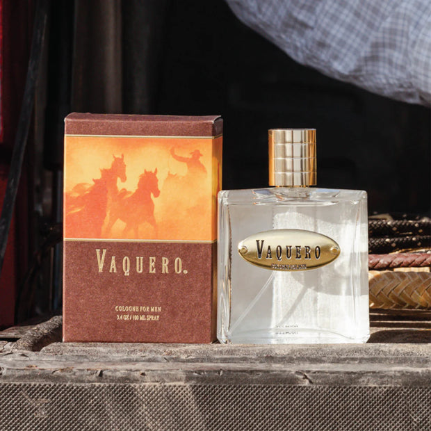Vaquero cologne bottle and packaging on a wooden surface