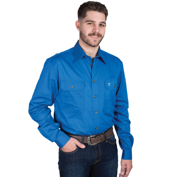 Man wearing a blue shirt with a logo on a white background