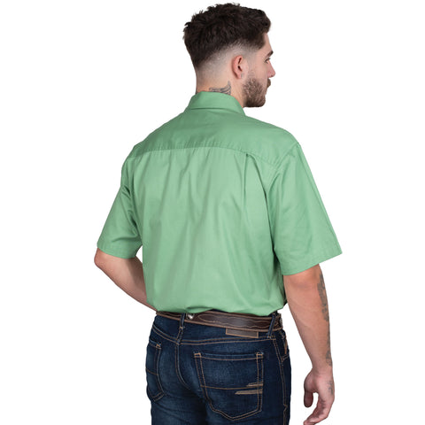 Man wearing a green short-sleeve shirt with a white background