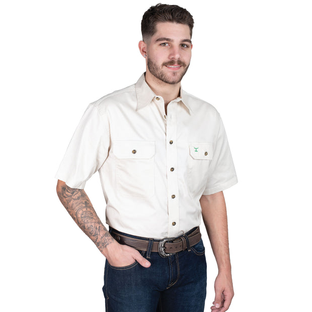Man wearing a white short-sleeve shirt with a logo on a white background