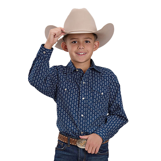 Child wearing a blue patterned shirt, beige cowboy hat, and jeans on a white background