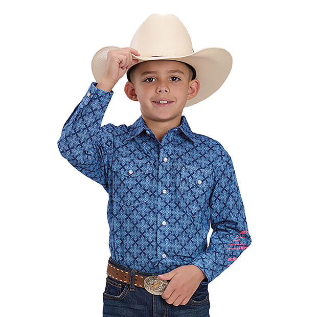 Child wearing a blue patterned shirt, jeans, and a beige cowboy hat on a white background