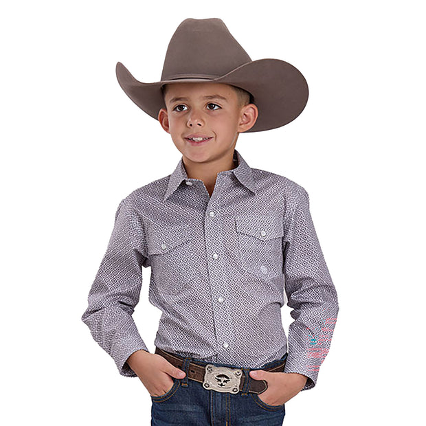 Child wearing a cowboy hat, patterned shirt, and jeans on a white background