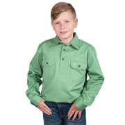 Child wearing a green shirt with a brand logo on a white background