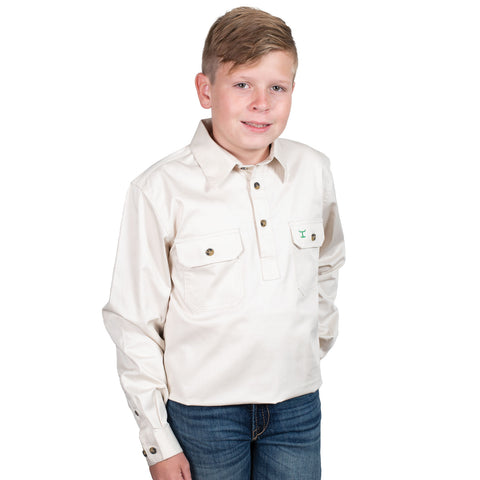 Young boy wearing a white shirt with a logo on a white background