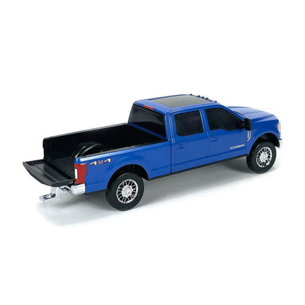 Blue toy truck on a white background