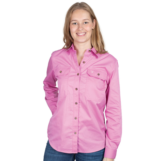 Woman wearing a pink shirt on a white background