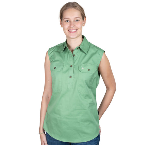 Woman wearing a green sleeveless shirt on a white background