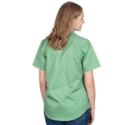 Woman wearing a green shirt with a white background