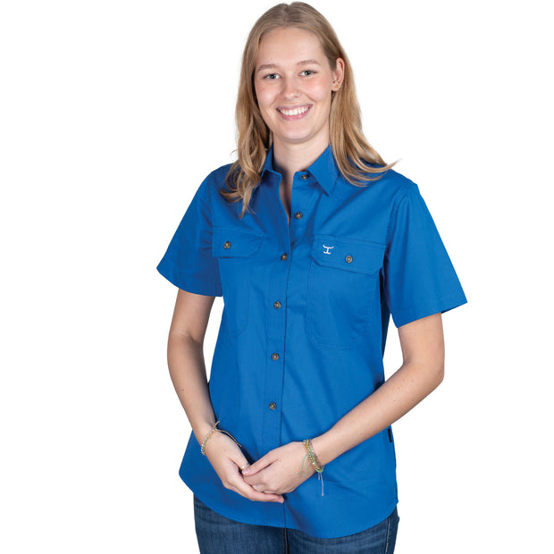 Woman wearing a blue shirt on a white background