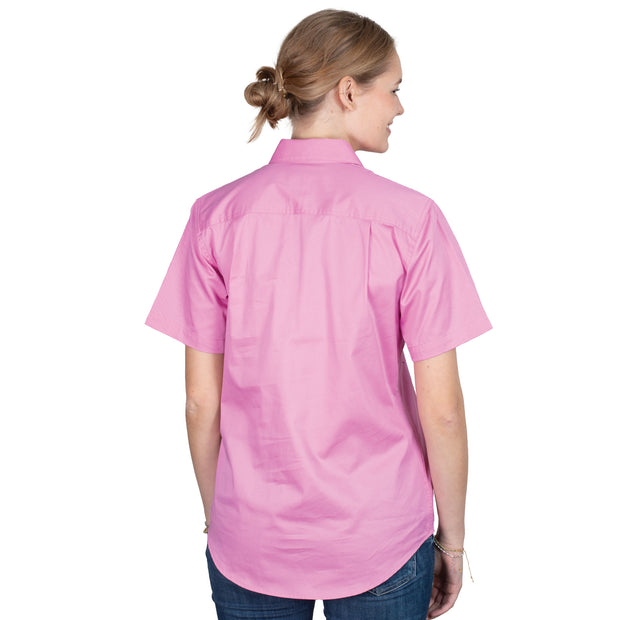Person wearing a pink shirt on a white background