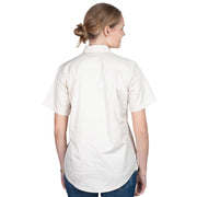 Woman wearing a white short-sleeve shirt with a logo on a white background