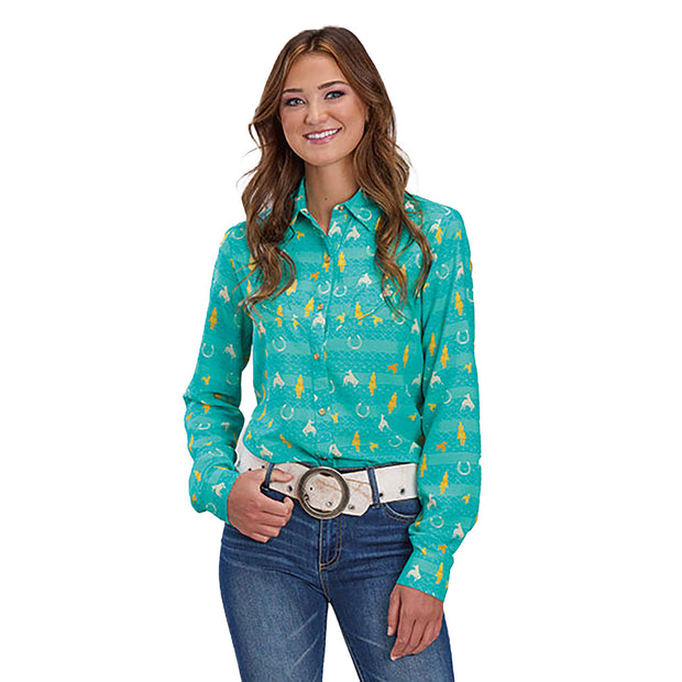 Woman wearing a teal patterned shirt and jeans on a white background