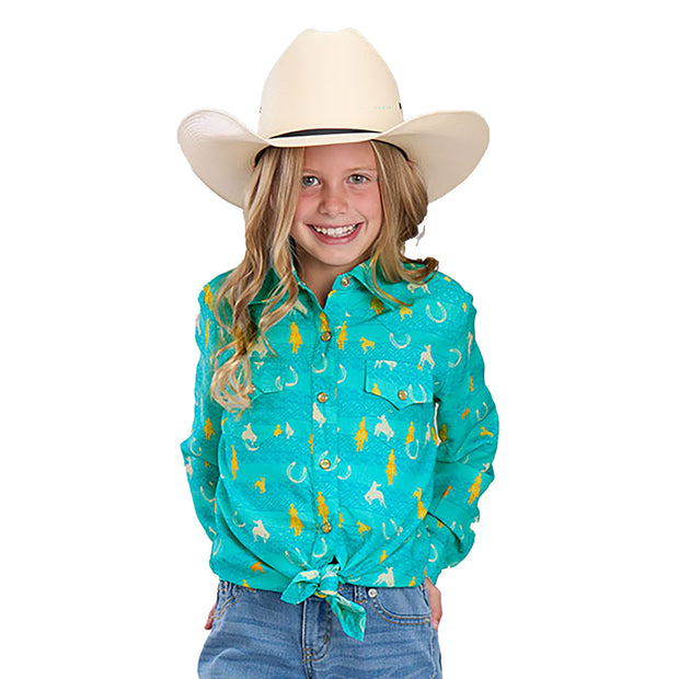 Young girl wearing a turquoise shirt with horse print and a beige cowboy hat on a white background