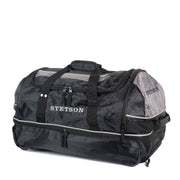 Black Stetson duffel bag with wheels on a white background
