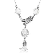 Necklace with turquoise stones and cowboy boot charm on a white background