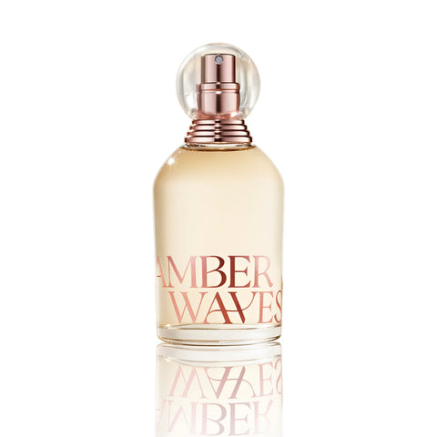Perfume bottle labeled 'Amber Waves' on a white background