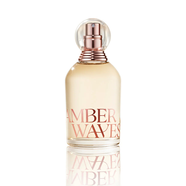 Perfume bottle labeled 'Amber Waves' on a white background