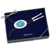 Bolo tie with turquoise stone and silver accents in a Montana Silversmiths box.