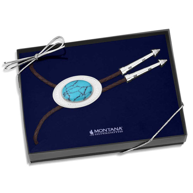 Bolo tie with turquoise stone and silver accents in a Montana Silversmiths box.