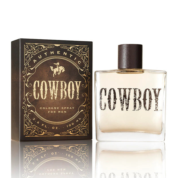 Cowboy cologne spray bottle and packaging on a white background