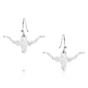 Silver longhorn bull head earrings on a white background