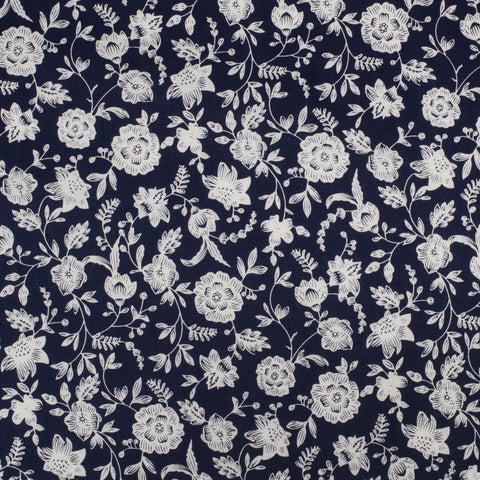 Navy blue fabric with white floral pattern