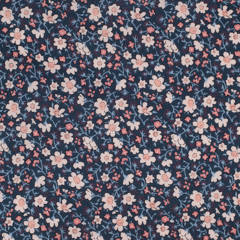 Floral pattern with small flowers on a dark blue background