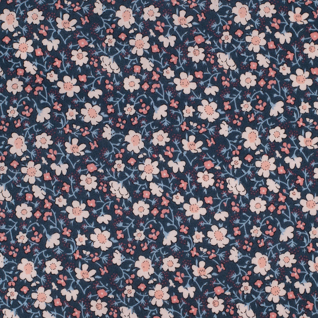 Floral pattern with small flowers on a dark blue background