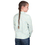 Young girl wearing a floral shirt with braided hair on a white background