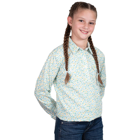 Young girl wearing a floral shirt with braided hair on a white background