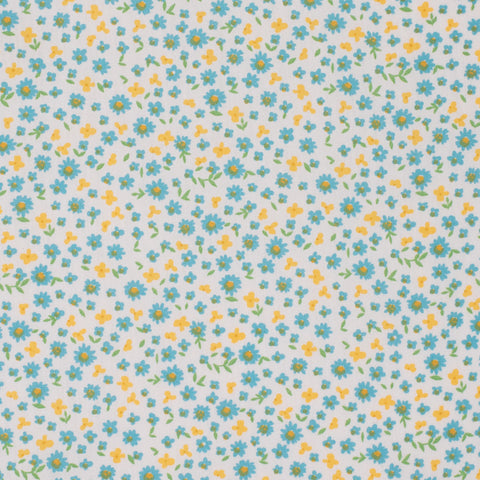 Pattern of small blue and yellow flowers on a light blue background