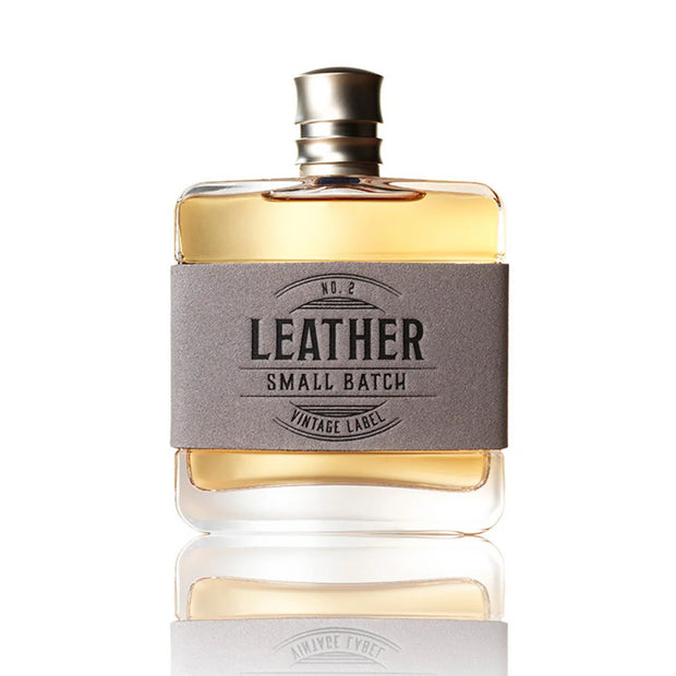 Perfume bottle labeled 'Leather Small Batch' on a white background
