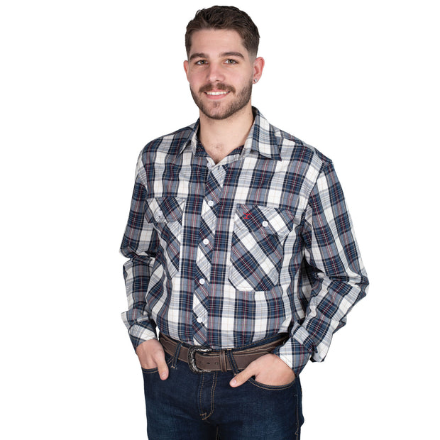 Man wearing a plaid shirt and jeans on a white background