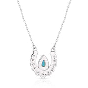 Necklace with a turquoise pendant on a white background