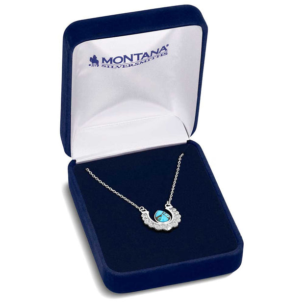 Necklace with turquoise stone in a Montana Silversmiths box on a white background