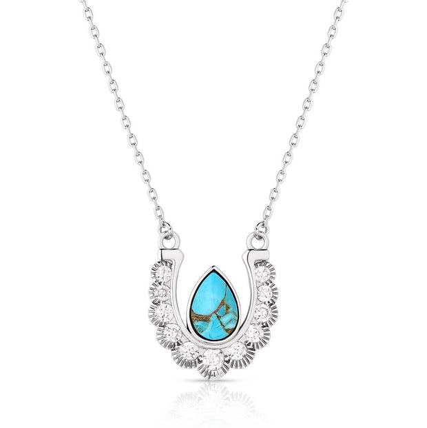 Necklace with a turquoise pendant on a white background