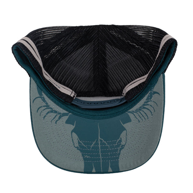 Dark teal trucker cap with skull logo and Roper brand