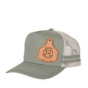 Green trucker hat with a leather patch on a white background