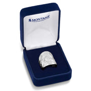 Silver ring in a blue Montana Silversmiths box on a white background
