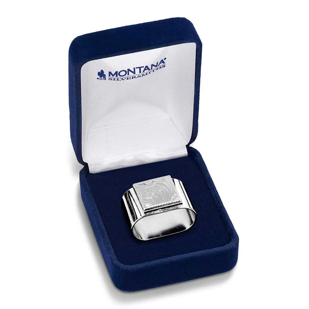 Silver ring in a blue velvet box with 'Montana Silversmiths' branding.