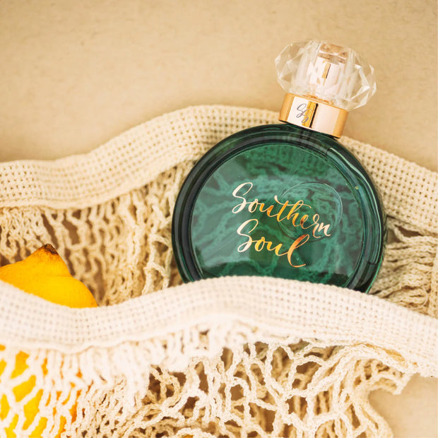 Perfume bottle labeled 'Southern Soul' on a textured surface