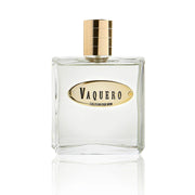 Vaquero cologne bottle with gold cap and label on a white background