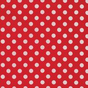 Red fabric with white polka dots