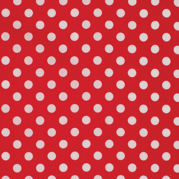 Red fabric with white polka dots