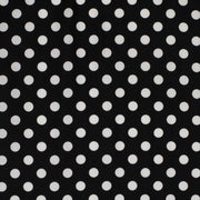 Black fabric with white polka dots